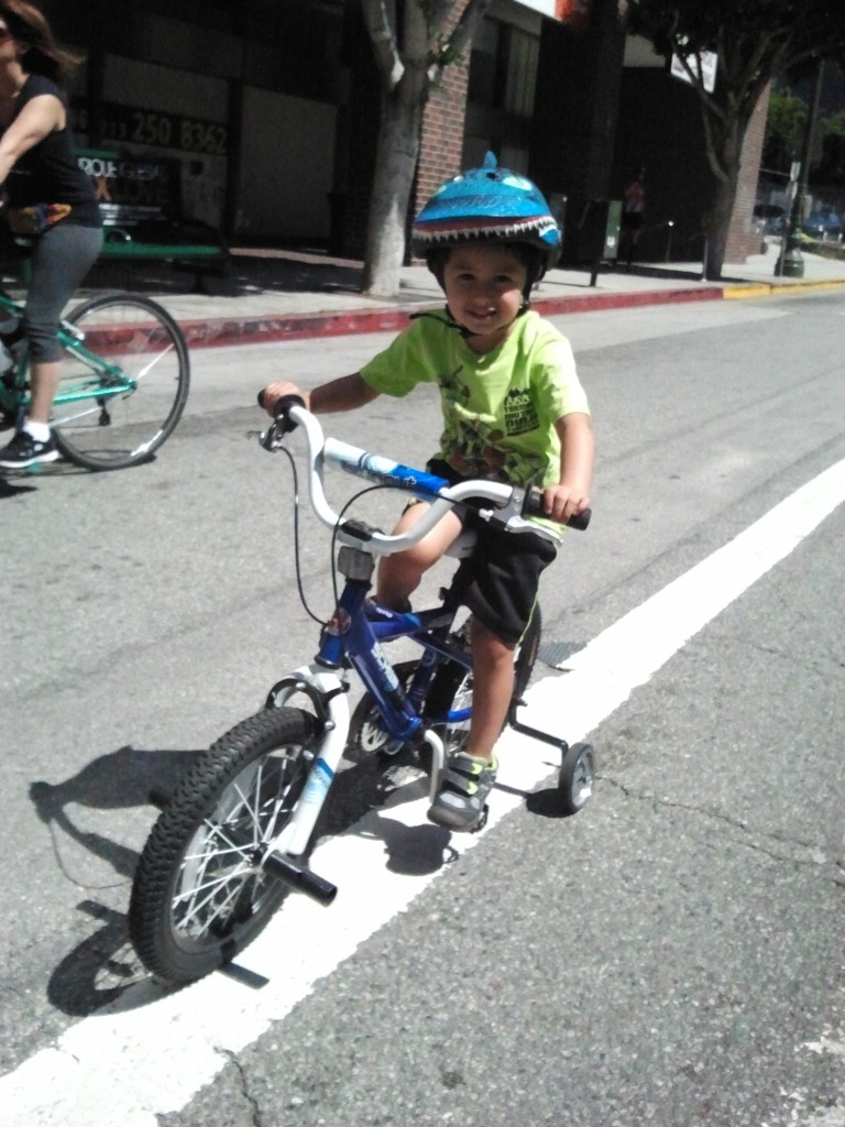 This little guy was very winded after riding up a small hill. And deservedly very proud of what he'd accomplished.